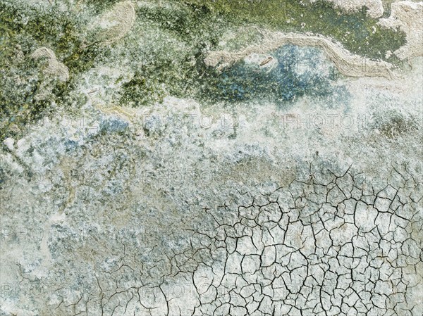 Detail of salt marshes near Sanlúcar de Barrameda. Aerial view. Drone shot. Cádiz province,