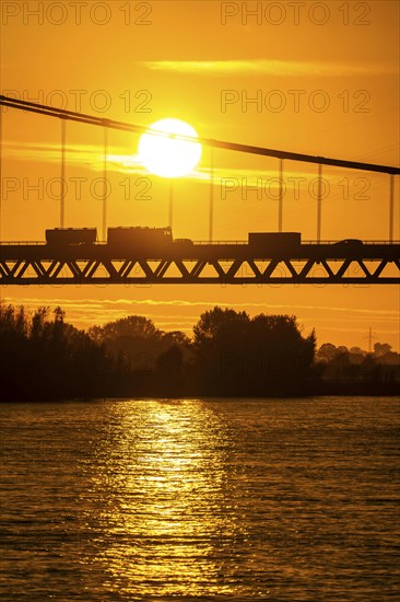 Traffic on the Rhine bridge Emmerich, federal road B220, evening light, with 803 m the longest