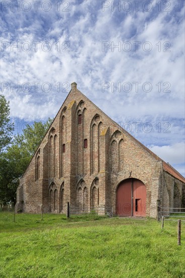 13th century Gothic monastic tithe barn of the Ter Doest Abbey at Lissewege near Bruges, West