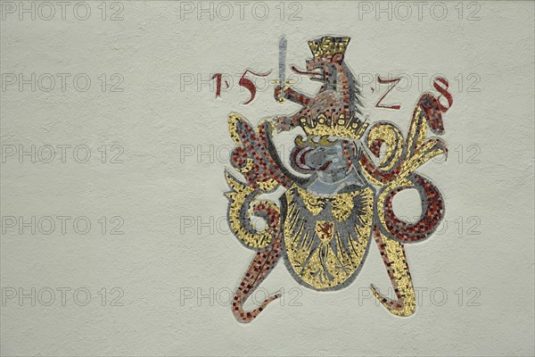 Town coat of arms with the year 1528, wall mosaic, heraldic animal, eagle figure, lion figure,