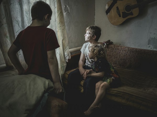 Sasha, 9 years old, Dima, 12 years old and Nastya, 5 years old. They live in the village of