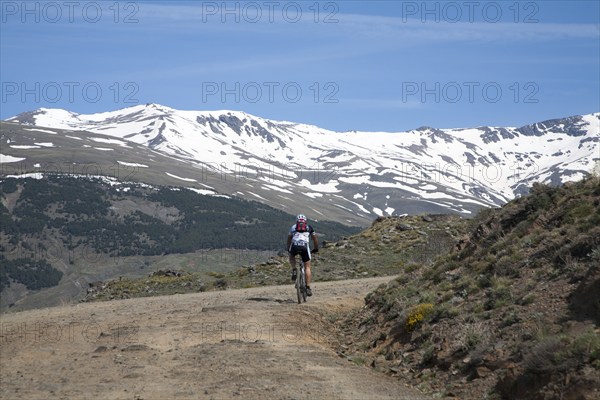 Cycling in the Sierra Nevada Mountains in the High Alpujarras, near Capileira, Granada Province,
