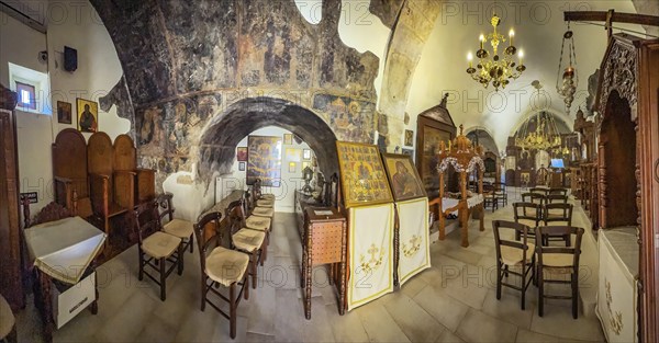 Panoramic view of the interior of the two-nave monastery church dedicated to the Assumption of the