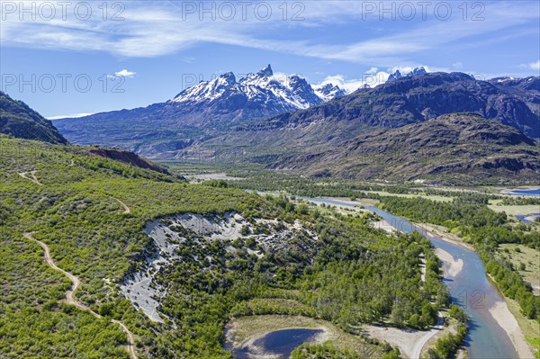 Aerial view over river Rio Tranquilo to mountain range of San Lorenzo, south of Cochrane, road