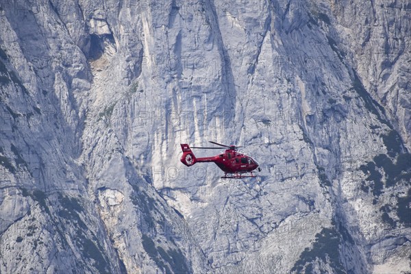 Airbus H135 helicopter in use as a rescue helicopter for the emergency doctor and the mountain