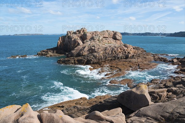 Rock formations on the coast with a view of the vast sea, Ploumanac'h, Ploumanach, Perros-Guirec,