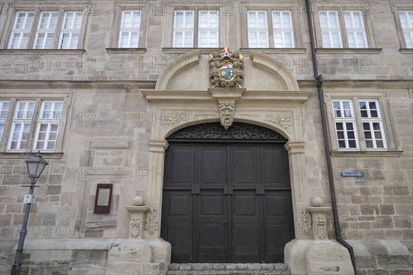 Former prince-bishop's rent office with coat of arms cartouche above the portal, from 1693, today
