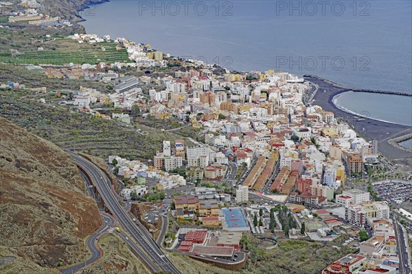 Coastal town with colourful houses situated between mountains and sea, Santa Cruz de la palma, no