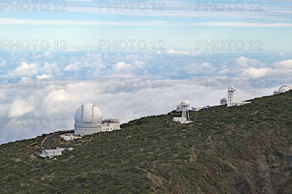 An observatory on a green hill with clouds and sky, trade winds, no light pollution, Observatory,