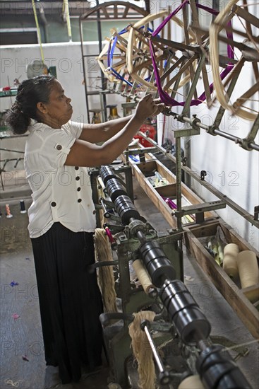 Sri Lankan woman in a weaving mill, Selyn Textiles, Kurunegala, North West Province, Sri Lanka,