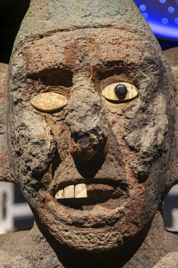 Stone carved face of Centzonhuitzuahuah, deity of pulque, archaeological site and museum of Templo