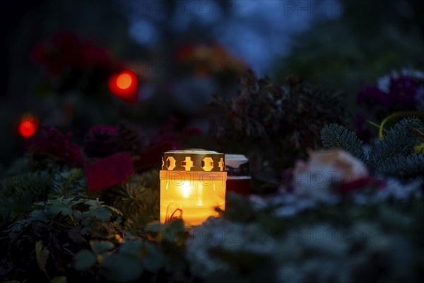 Grave lights on Sunday of the dead at the cemetery in Possendorf. Possendorf, Saxony, Germany,