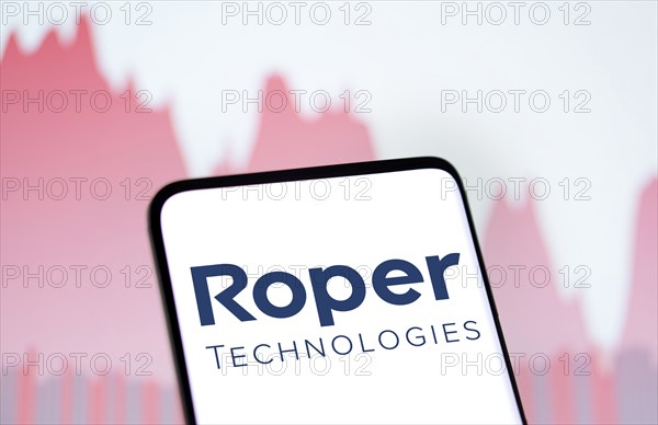 Roper Technologies logo is displayed on smartphone. Roper Technologies Inc is an American