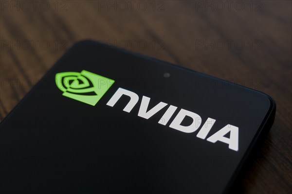 In this photo illustration, the Nvidia Corporation logo is displayed on a smartphone screen