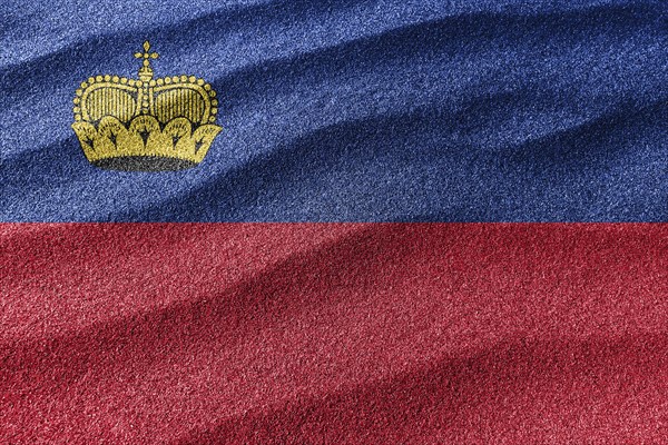 Liechtenstein sand flag, national flag sand background