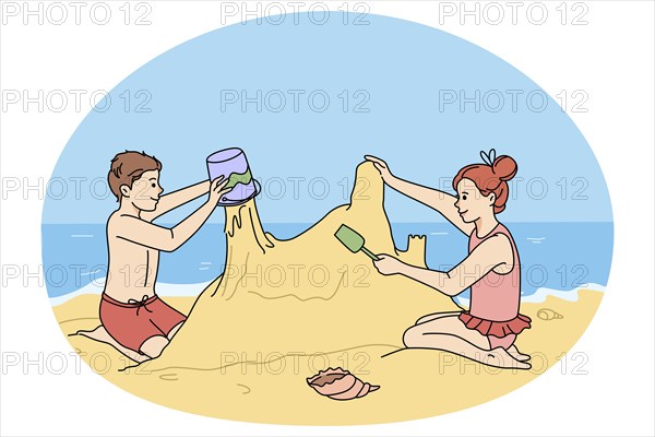 Happy children building sand castle on beach on summer holidays. Smiling little kids play with