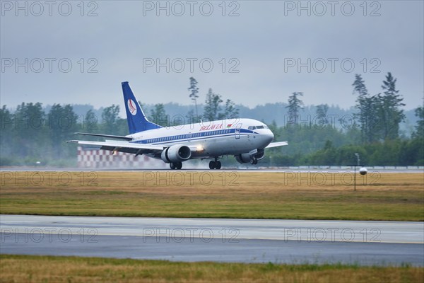 MINSK, BELARUS, JUNE 15, 2018: Belavia belarusian airlines flight Boeing 737-300 plane landing on