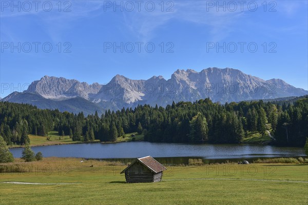 View of the Karwendel Mountains near Mittenwald, in the foreground Lake Gerold in Werdenfelser