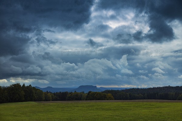 Dark clouds over the Lilienstein in Saxon Switzerland in the Basteige area