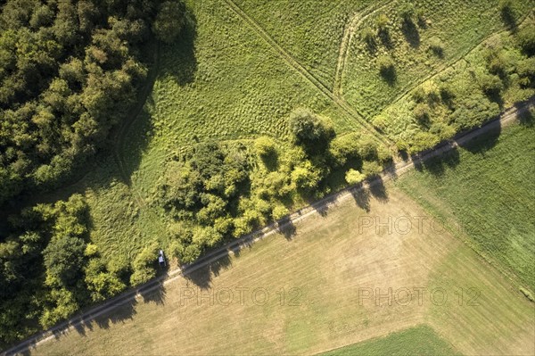 Aerial view of the Kolonnenweg along the former inner-German border, marking the green belt between