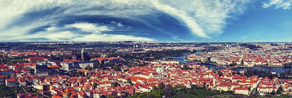 Vintage retro hipster style travel image of aerial panorama of Hradchany: the Saint Vitus (St.