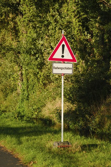 Cycle path damage, traffic sign, general danger zone, Emsland, Lower Saxony, Germany, Europe