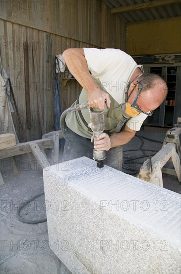 Demitz-Thumitz large quarry. The crushed granite is used to produce block steps, floor coverings,