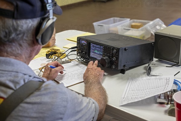 Bosque Farms, New Mexico, Paul Ridley, an amateur radio operator, operates a Morse code station