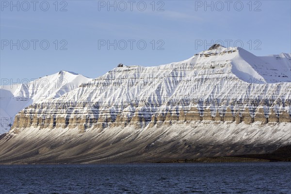 Snow covered mountains at Billefjorden, central fjord of the Isfjorden, Svalbard, Spitsbergen,