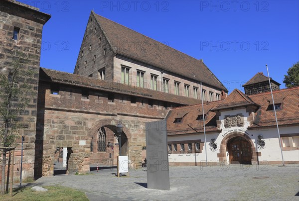 In the historic centre of Nuremberg, the Carthusian Gate, behind it the building of the Germanic