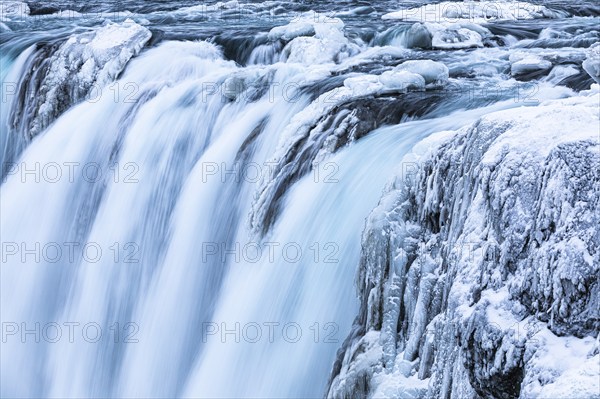 Godafoss waterfall, icy and snowy rock face, Northern Iceland Eyestra, Iceland, Europe