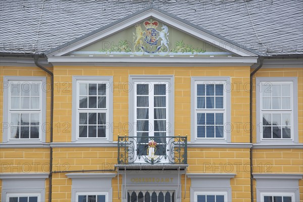 House facade and coat of arms with unicorn and lion figure from the Upper Mining Authority,