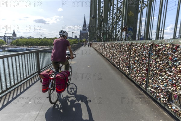 Cycling from a first-person perspective on a shared footpath and cycle path over the Hohenzollern