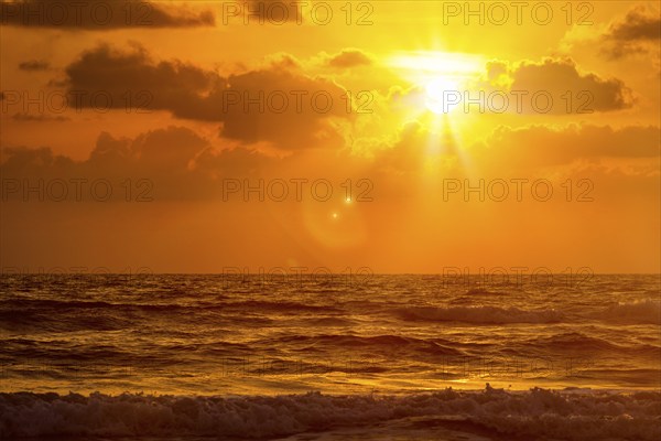 Ocean sunset at Baga beach. Goa, India, Asia