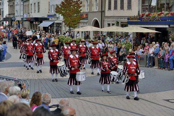 Local costume group parading at Zwetschgenfest, plum festival, Bühl, Baden, Baden-Württemberg,