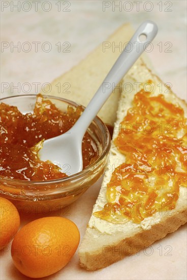 Kumquat-jam (Fortunella) in shell, on toast, -jam, jam, fruit spread