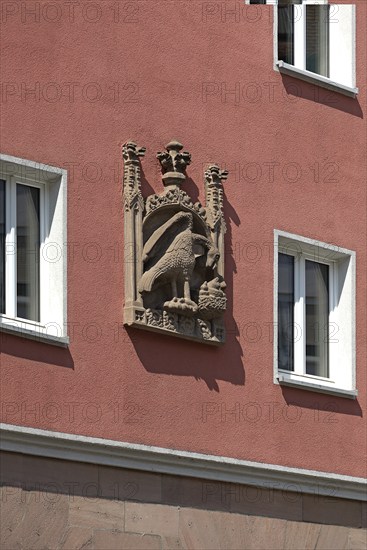 House sign, relief, eagle feeding its young in the nest, Bergstr. 13 ud 15, Nuremberg, Middle