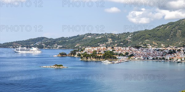 Skiathos town with cruise ship holiday by the sea panorama on the Mediterranean island of Skiathos,