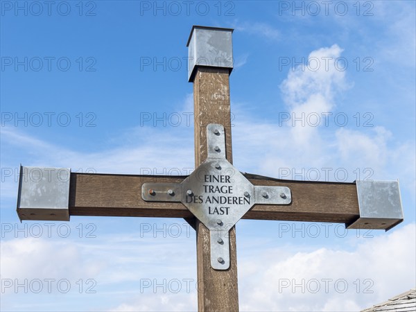 Christian cross with inscription, One bears the other's burden, Hochwald summit, Zittau Mountains,