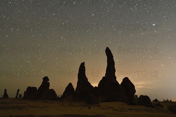 Starry sky above the mystical rock formations of Gharameel, AlUla region, Medina province, Saudi