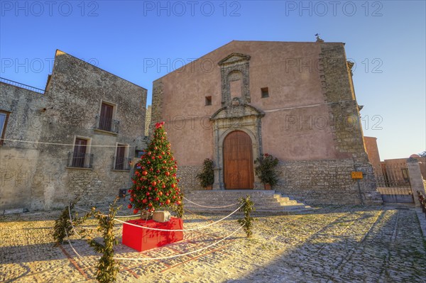 Morning light, decorated Christmas tree, Piazzetta San Giuliano, Erice, Trapani province, mountain,