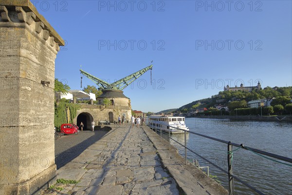 River promenade with historic city fortifications with Alter Kranen on the Main and Marienberg