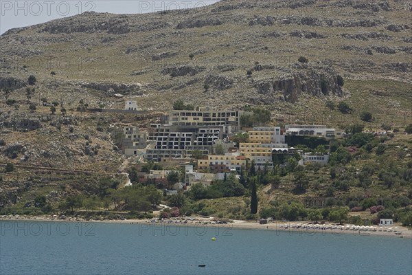 Rhodes Island, Lindos, Lindos is a town on the Greek island of Rhodes. Its landmark is the