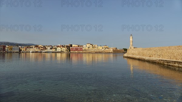 Venetian old town, Venetian harbour, row of houses, colourful houses, Venetian lighthouse, calm