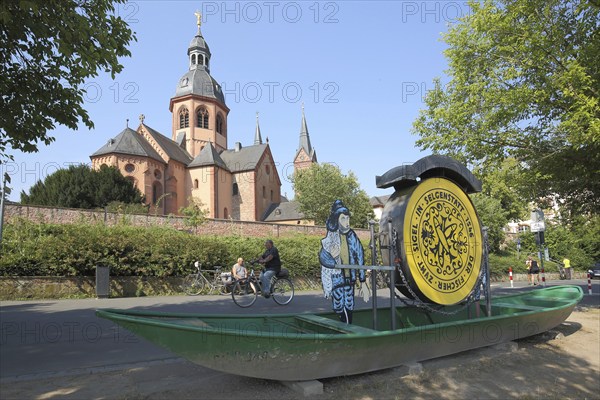 Einhard Basilica of St. Marcellinus and Peter and boat with seal on the road, cyclist, monastery