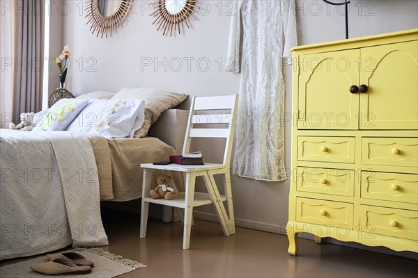 Use of folding stepladder chair in bedroom