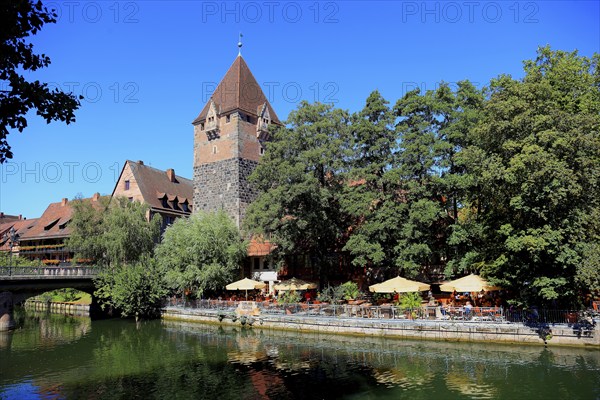 In the historic centre of Nuremberg, houses and restaurant with beer garden on the island of
