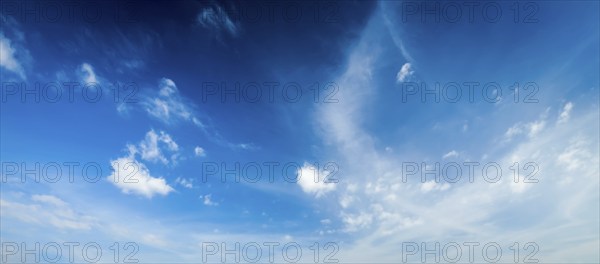 Blue sky with white cirrus clouds