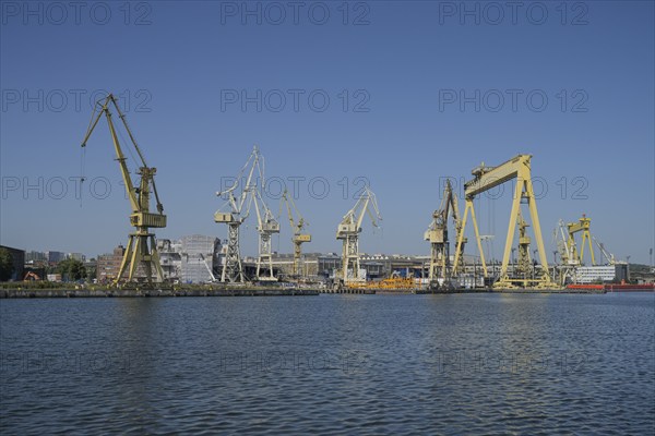 Cranes, old shipyard Stocznia Szczecinska Wulkan, Szczecin, West Pomeranian Voivodeship, Poland,