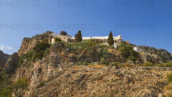 View from below, rock monastery, trees, Kapsa, Orthodox monastery, East Crete, South coast,